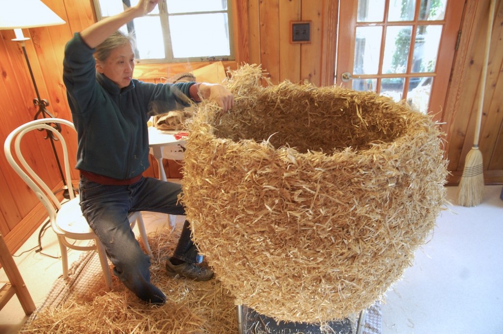 Working on a large straw sculpture at the Bernheim artist's house.